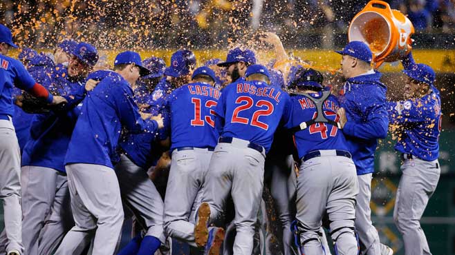 the-chicago-cubs-douse-each-other-after-defeating-the-pittsburgh-pirates-in-the-national-league-wild-card-baseball-game-4-0.jpg